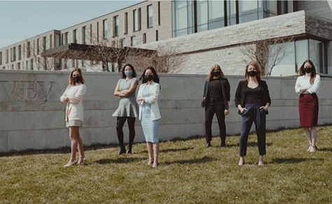 Female Students In Formal Attire Outside Ivey Building