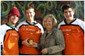 The Dean brings hot coffee to HBA students living outside for '5 Days for the Homeless' this spring.