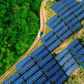 Blue solar panels on an agricultural field