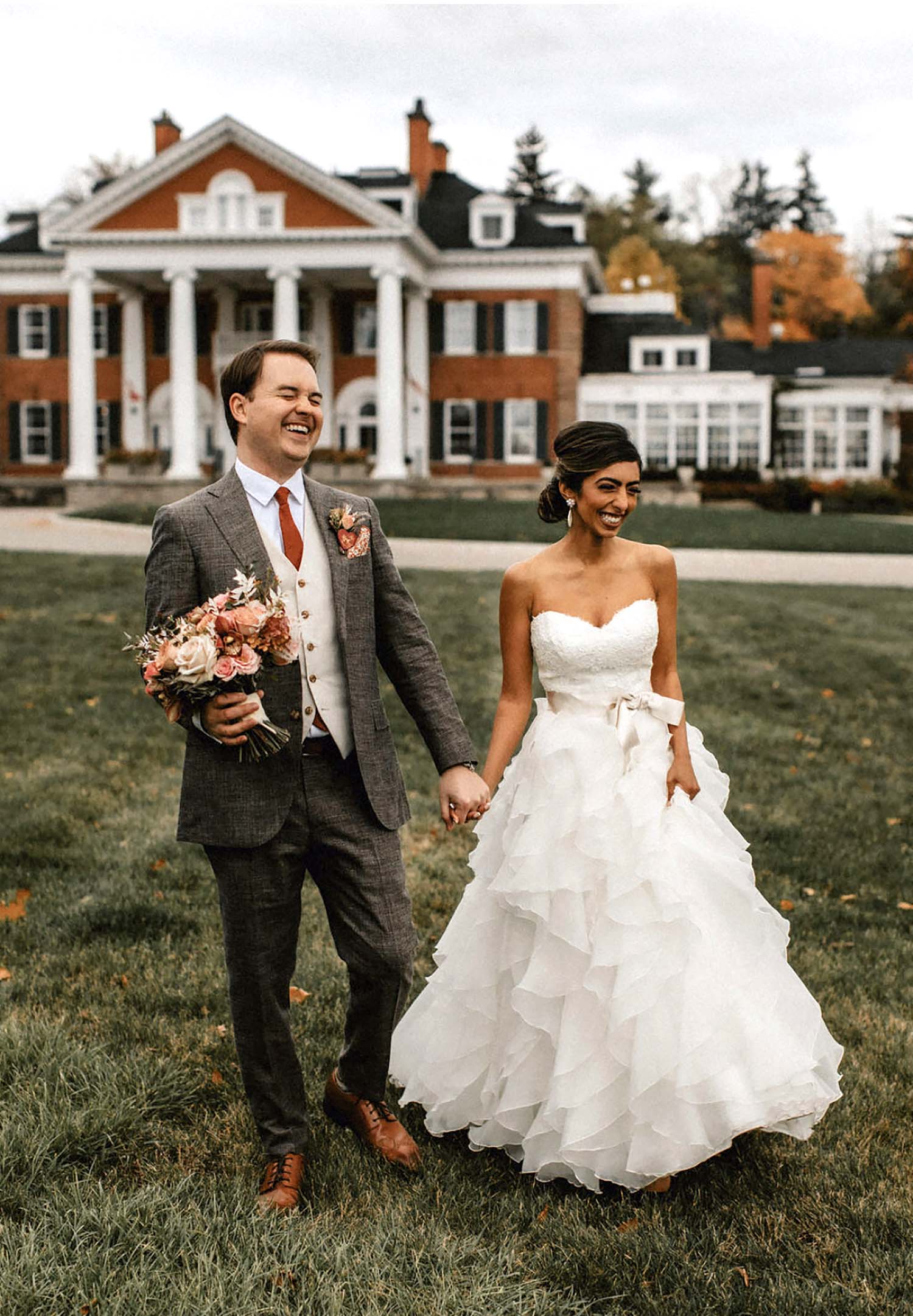 Tom Robertson and his wife walking wedding photo