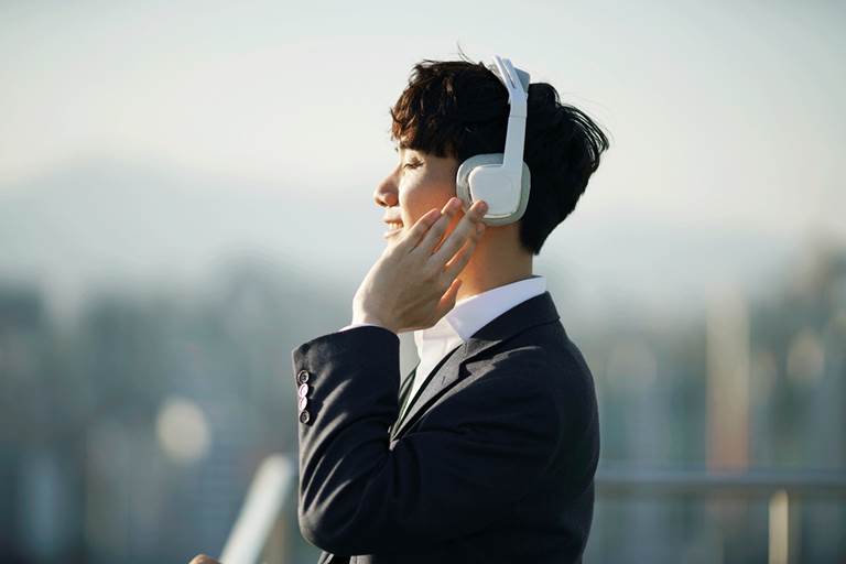 Businessman wearing headphones