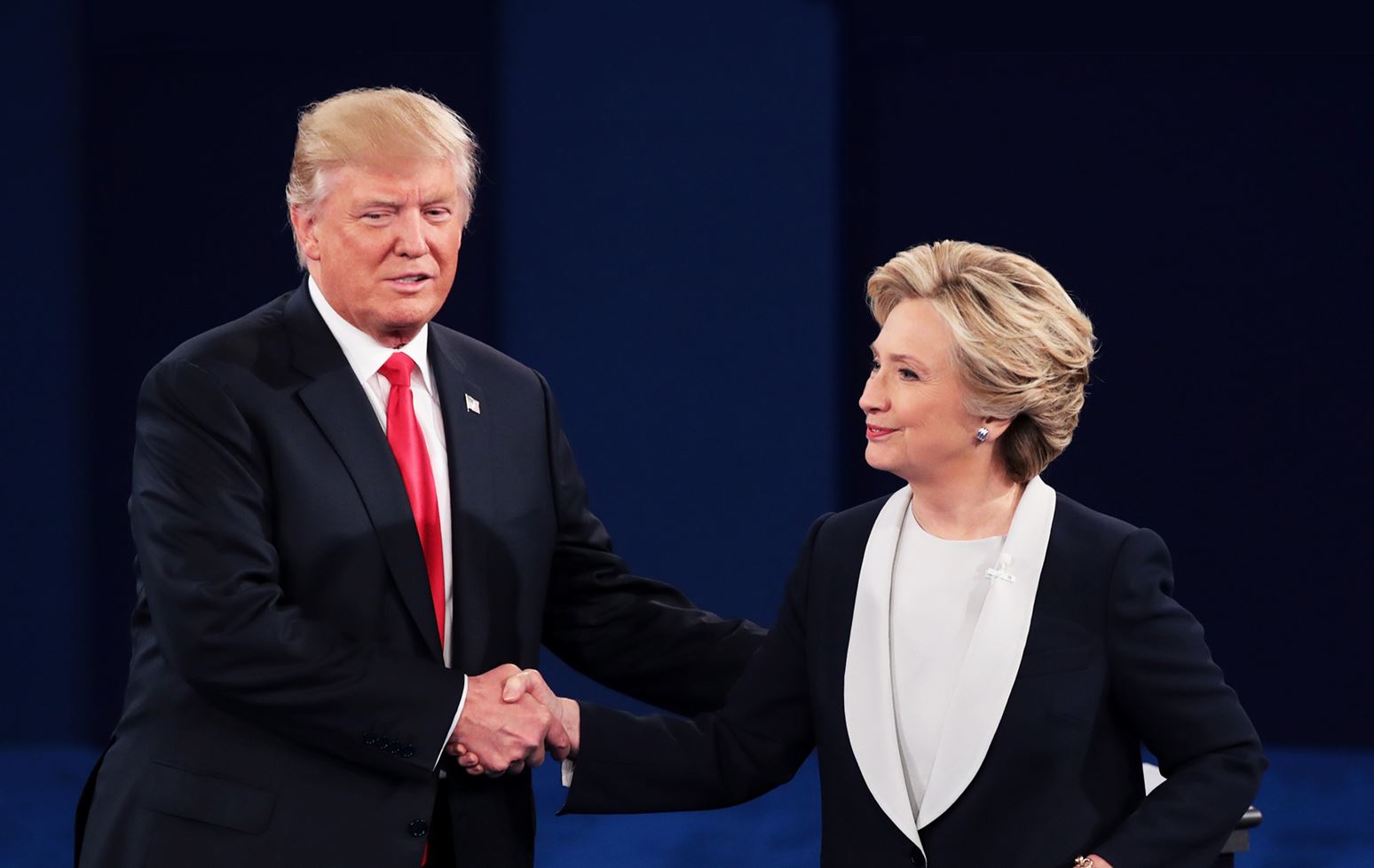 Trump and Clinton shaking hands