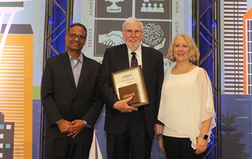 Peter Bell receives distinguished service award