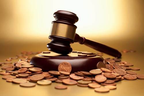 Gavel Surrounded By Coins