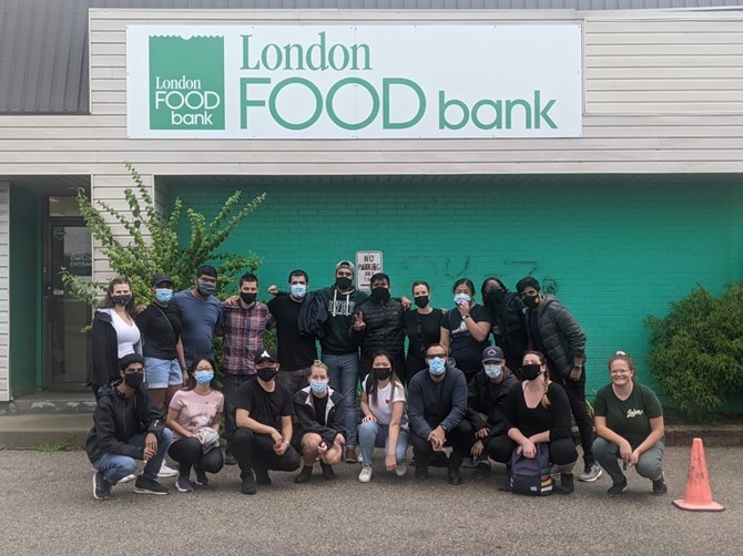 The London Food Bank group discussed food security while helping out.