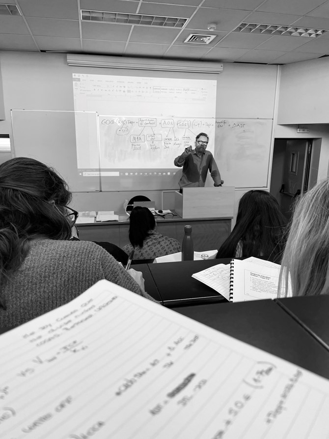 George Athanassakos presenting to students in the Graduate MSc Program in Risk Management at the University of Athens in Athens, Greece