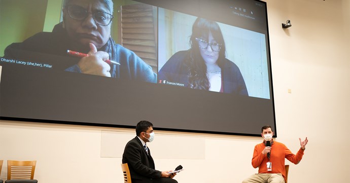 L-r: Jash Kalyani and Joe Antone (onstage), Dharshi Lacey and Frances Moore (on screen in background)