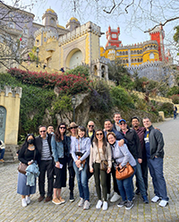 EMBA participants in front of a castle in Portugal