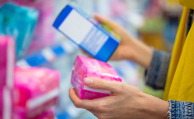 woman buying tampons