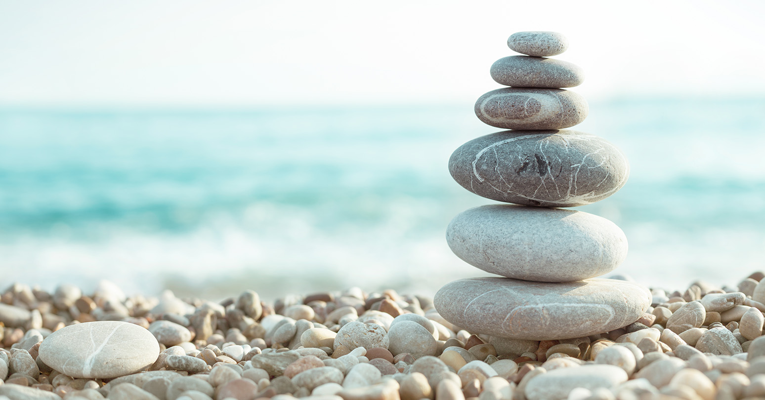 Stonesstackedonabeach