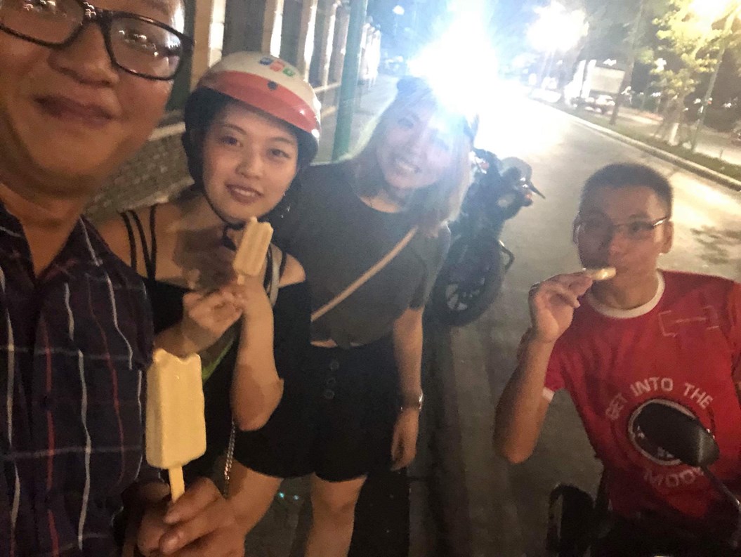 A group holding some popsicles