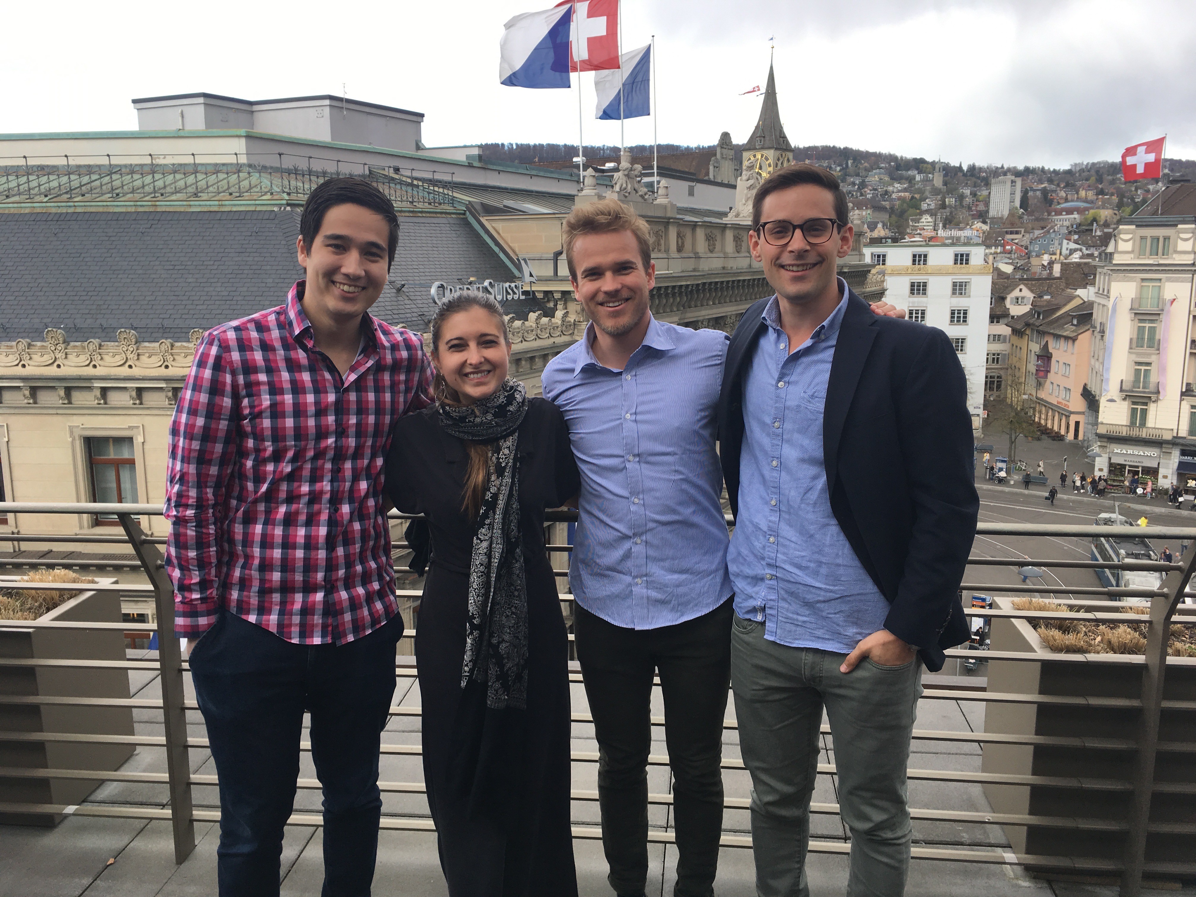 Katy Bauer and her Impact Investing team from the rooftop terrace at UBS headquarters