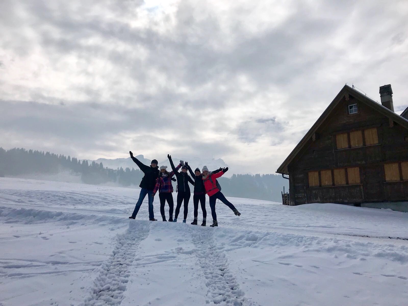 Some students outside in the snow