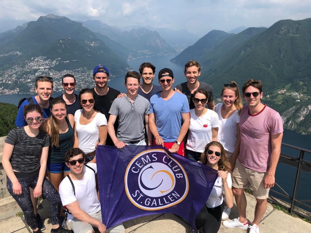 A group ot students holding a CEMS Club banner at the Lantieri Winery