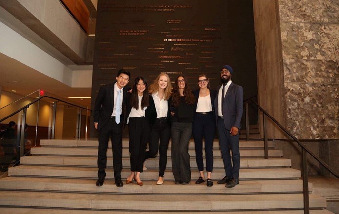 A group of students inside the Ivey Business School