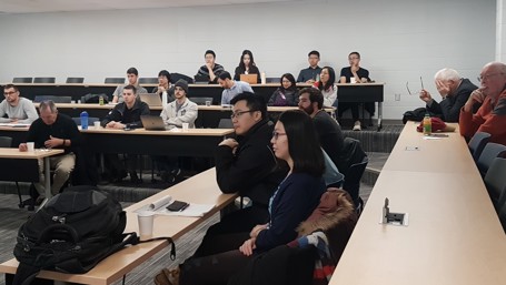 Students listening to Dr. Athanassakos' value investing speech