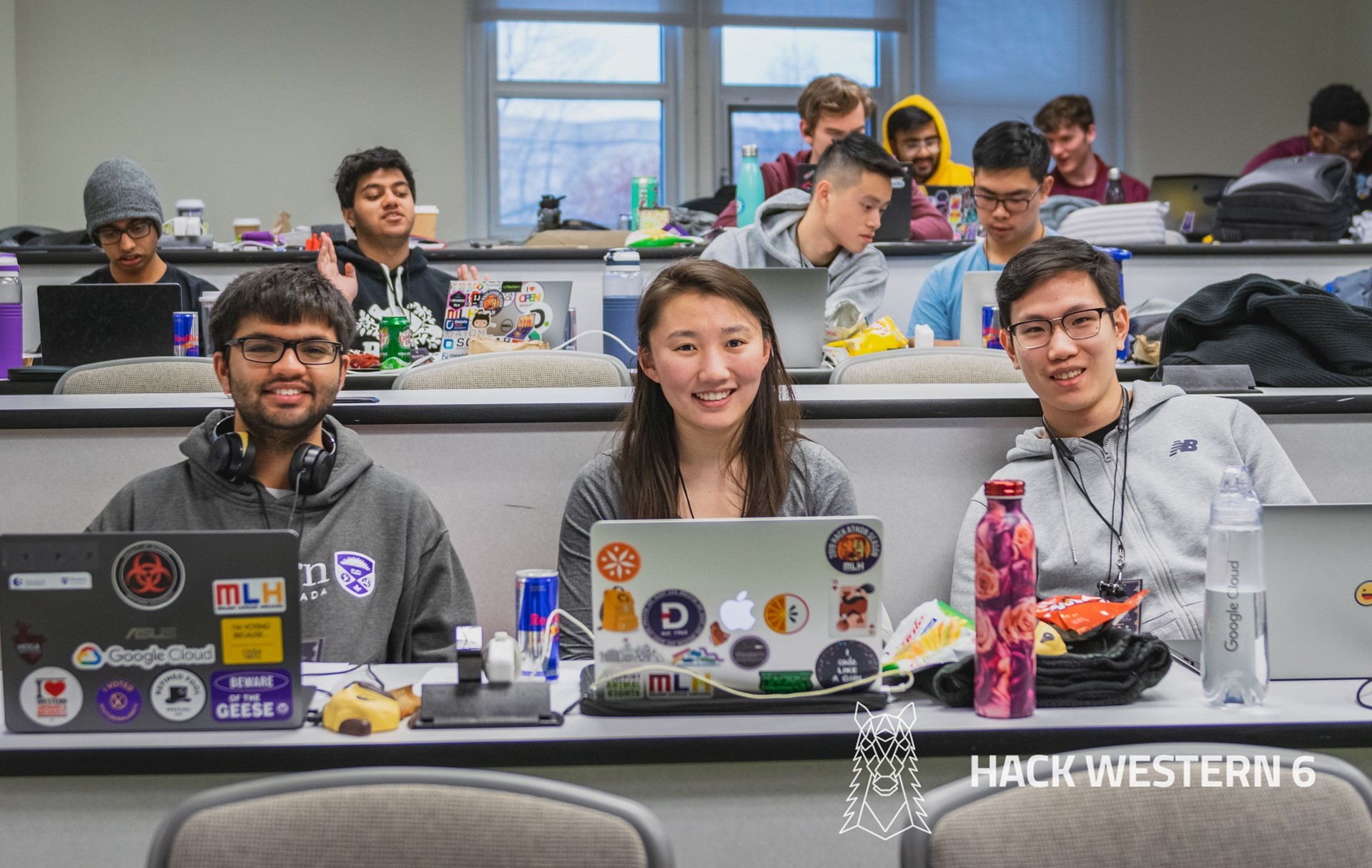 Group of students working on their laptops at the Hack Western 6 event