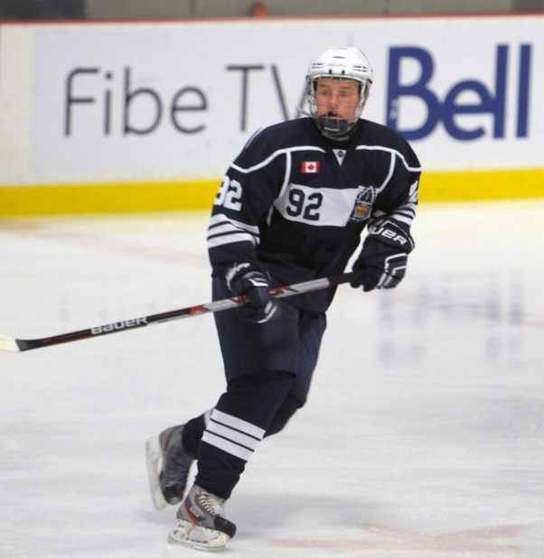 Aidan McFarlane playing hockey