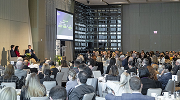 A shot showing speakers and guests at an event