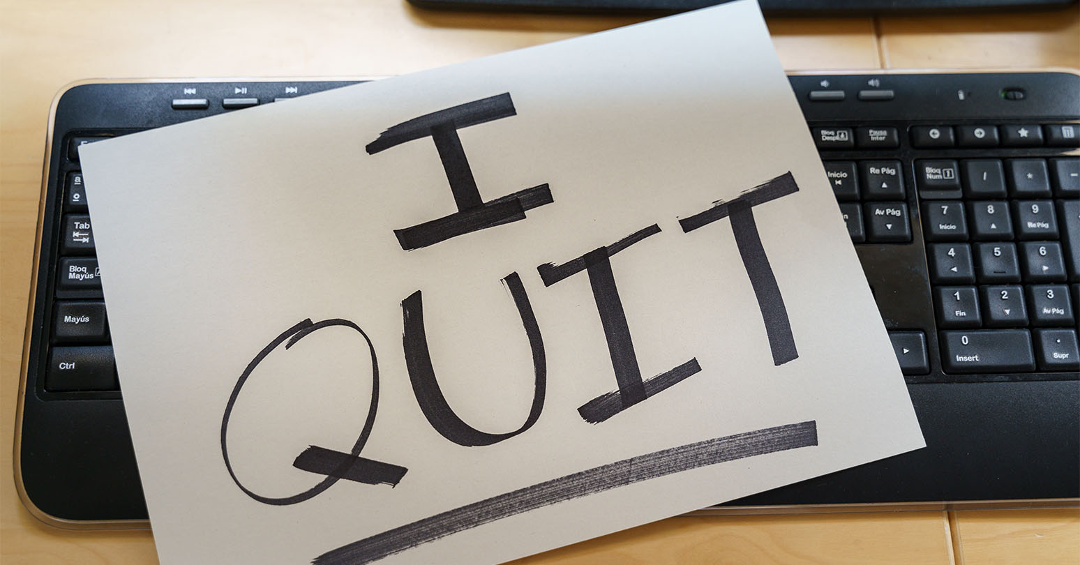 I Quit sign on a computer keyboard