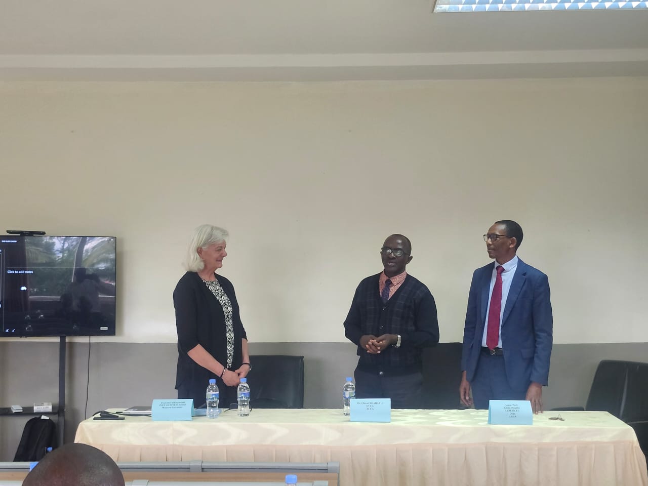 Professor Iris Berdrow with Dr Ndayayo Claver (DVC for Academics) & Associate Professor Gisanabagabo Sebuhuzu (Dean of the faculty of business administration)