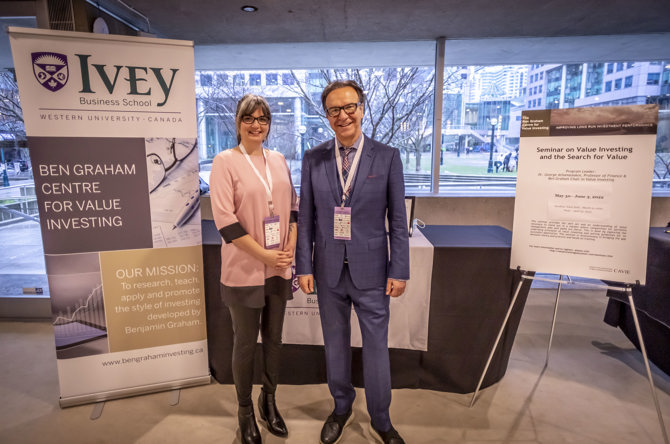 Ali Rilett & George Athanassakos at the Ivey Booth