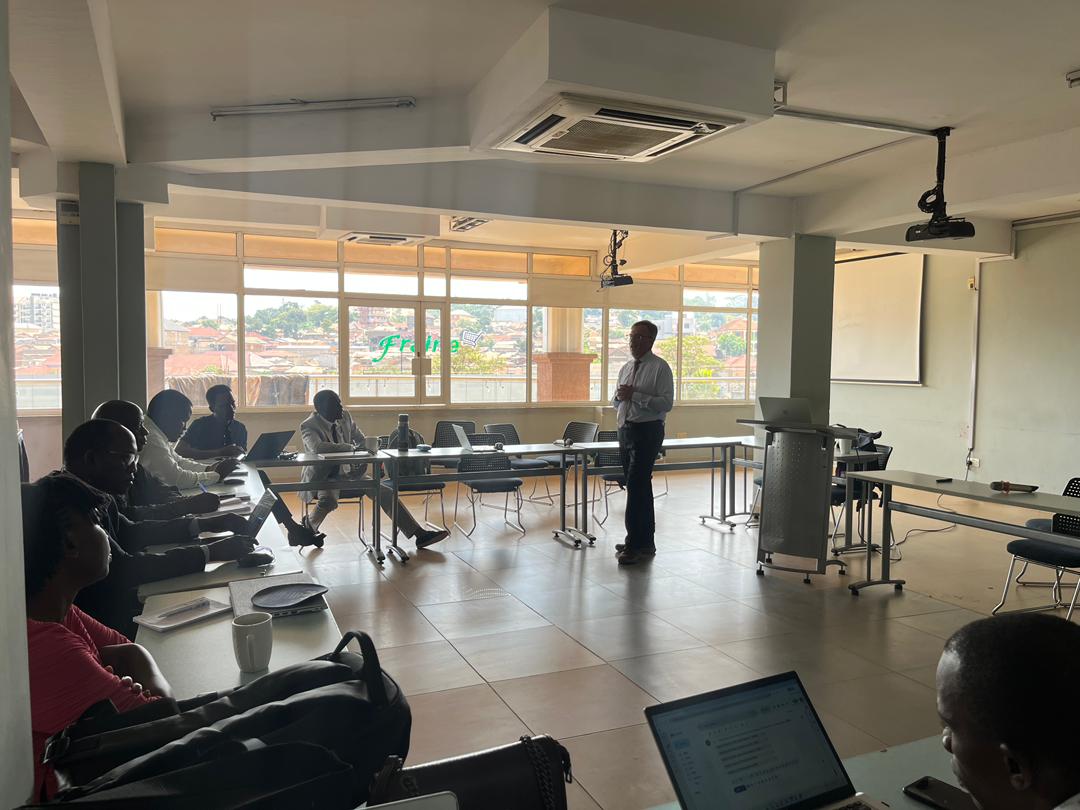 Professor Michael Roberts is explaining the case teaching method to the faculties of Cavendish University Uganda