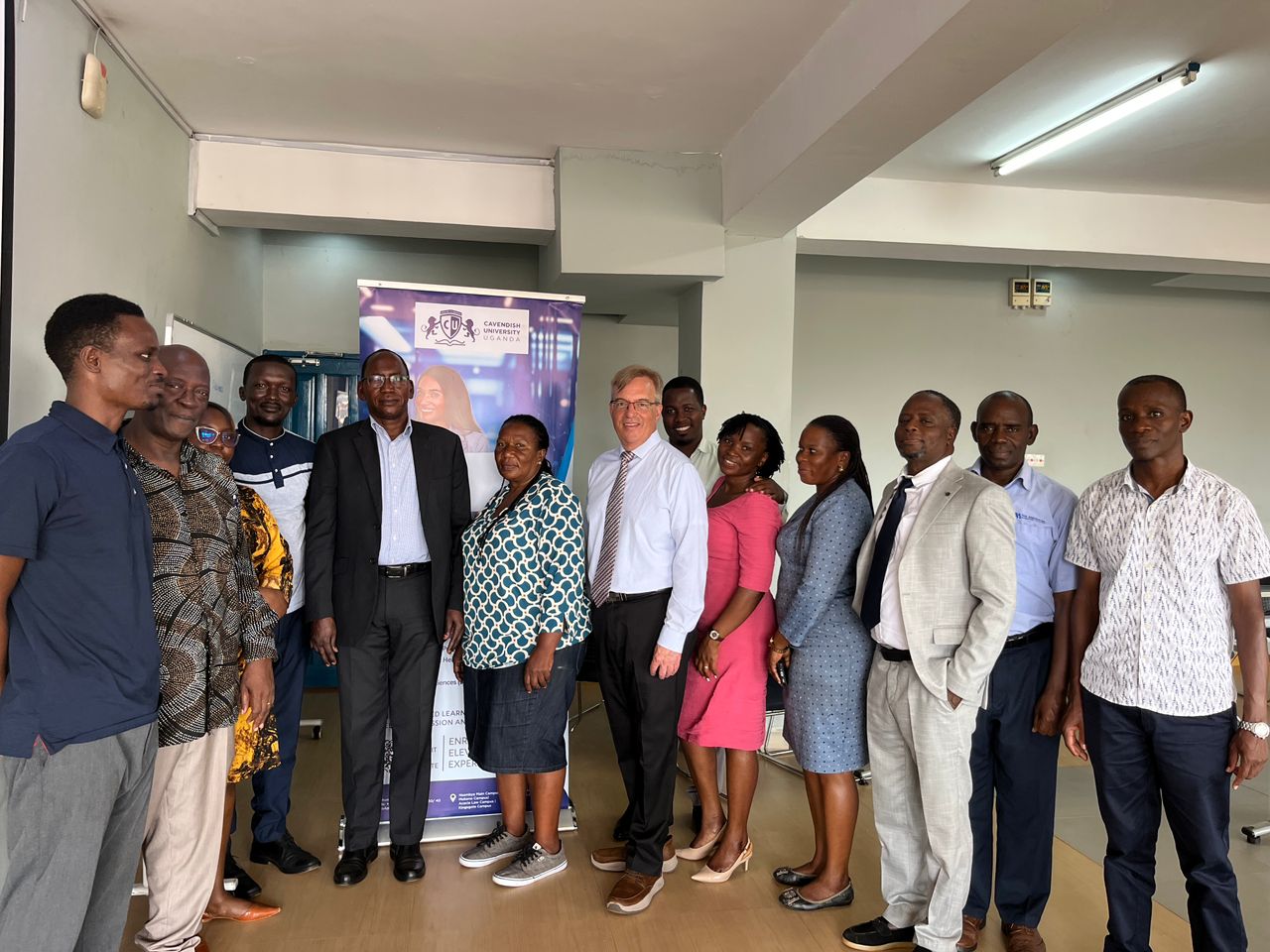 Professor Michael Roberts posing for a group photo after the workshop.