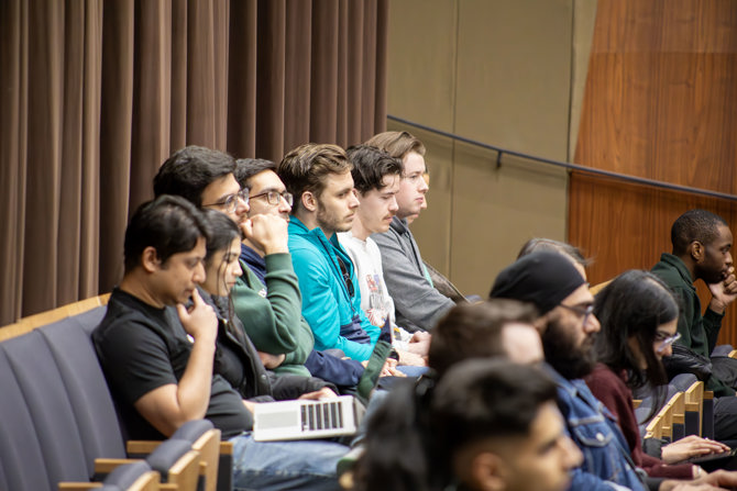 Audience members watching Paul Johnson's virtual presentation