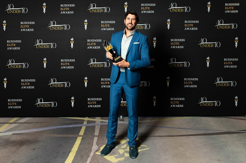 Kevin Mako receiving the Top 40 Under 40 award