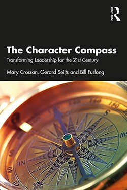 Book cover with golden coloured compass