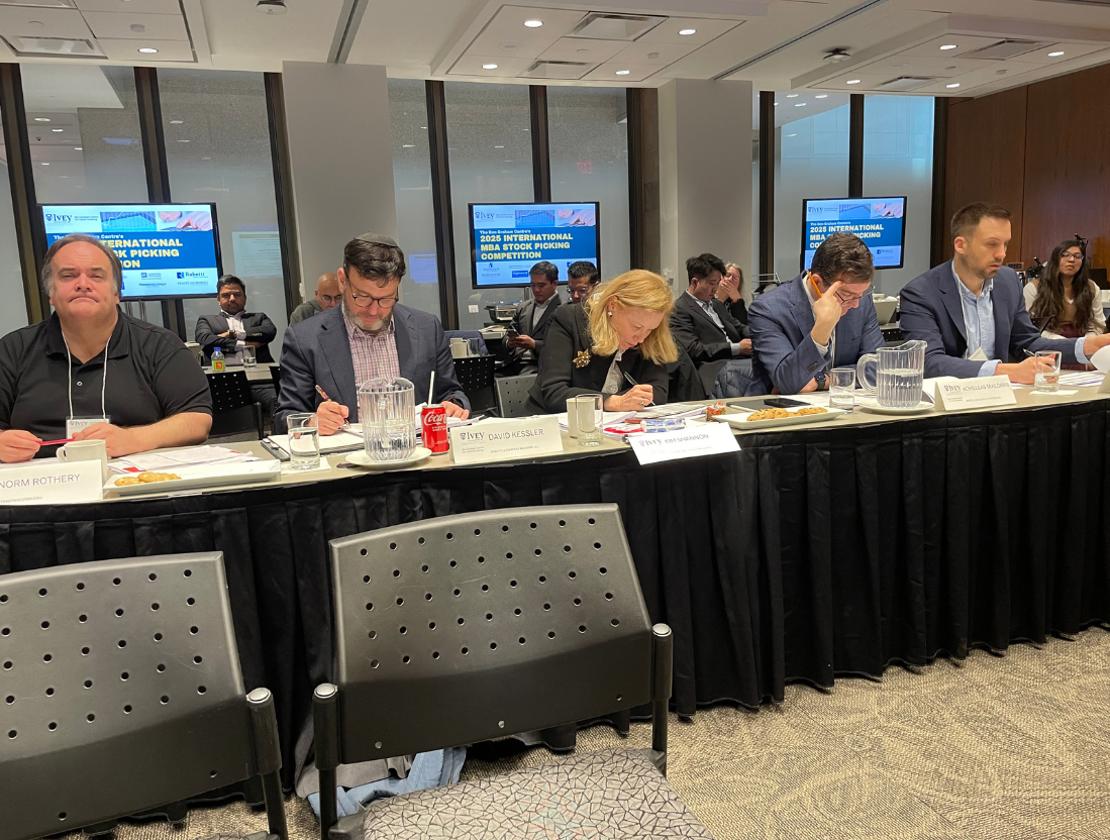 Judges Deliberating and Watching Presenters