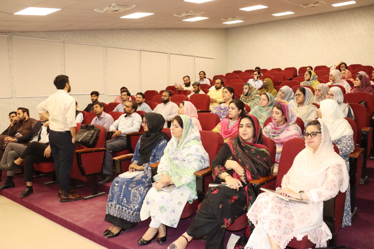 Faculty members are paying attention during the workshop