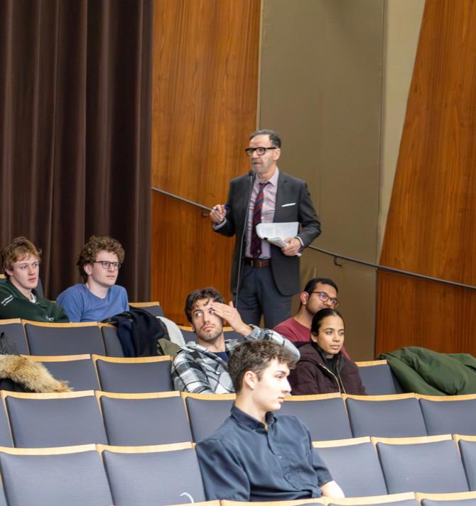 George Athanassakos introducing Rupel Ruparelia to the students