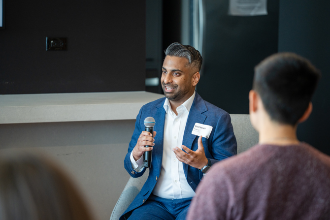 Jeremiah Pariag, EMBA ’25 answering questions from the moderator and audience