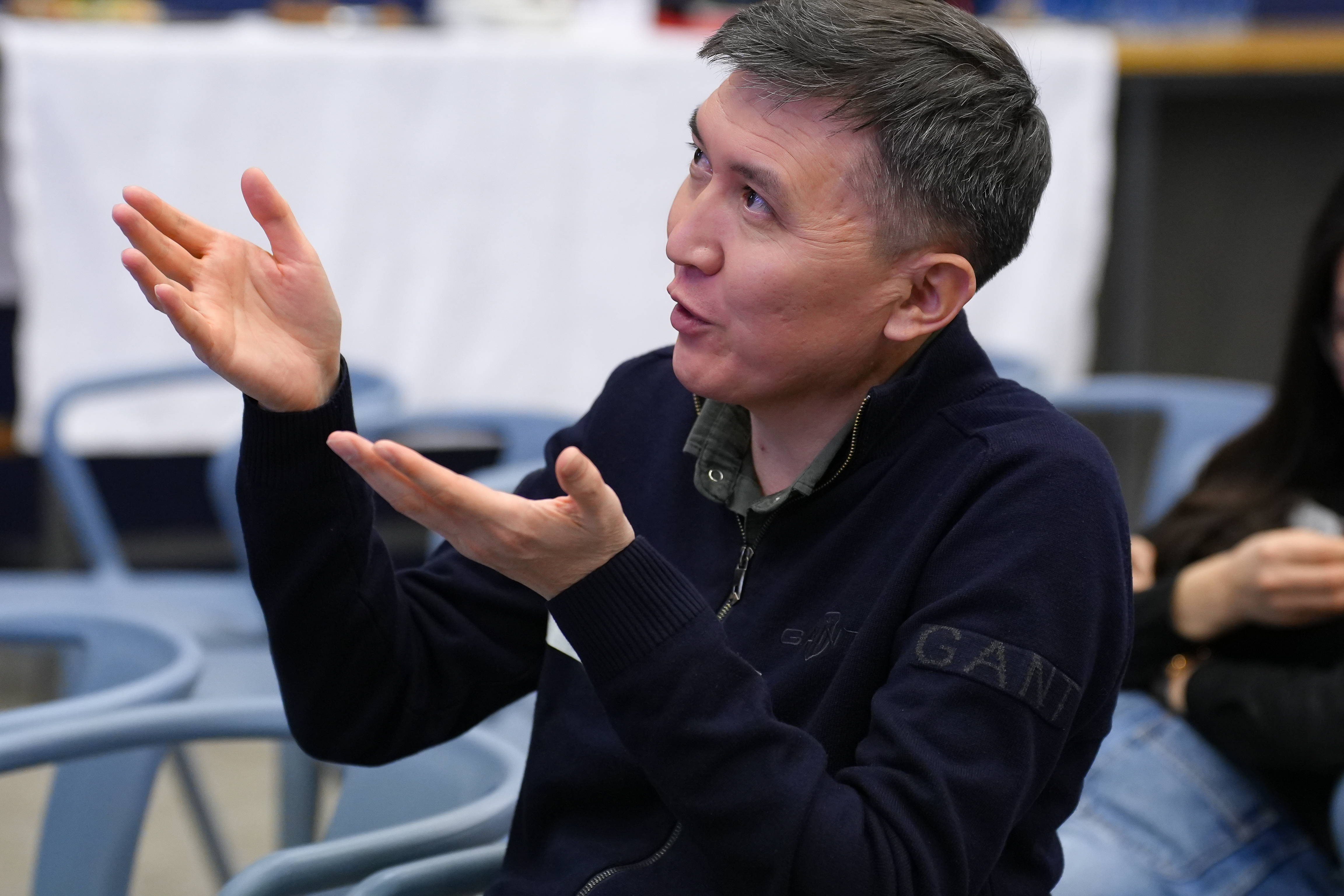 A faculty from American University of Central Asia asking questions to Professor Glenn Rowe during the workshop