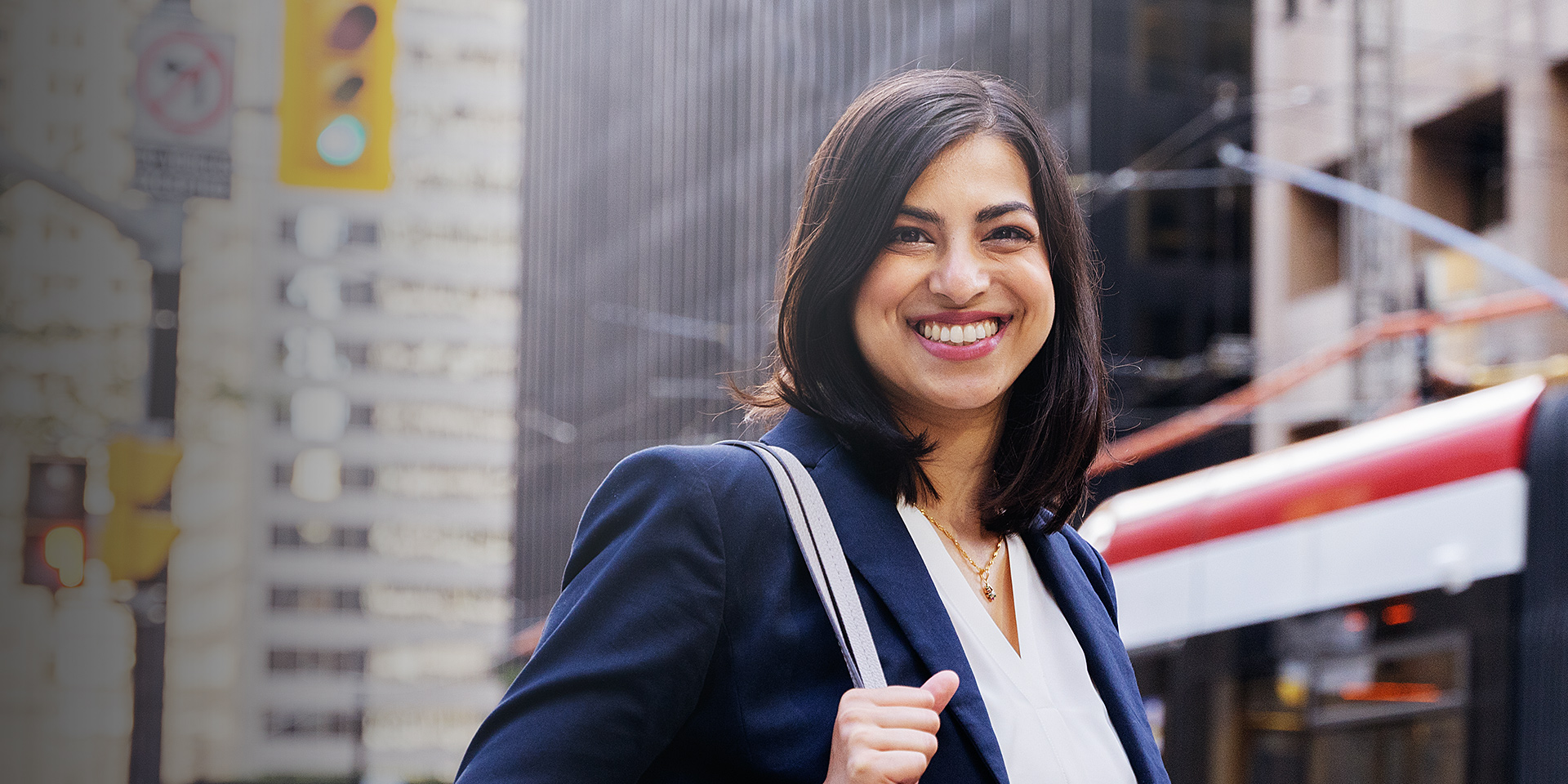 A woman standing in downtown Toronto