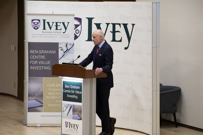 Dennison answering questions from audience