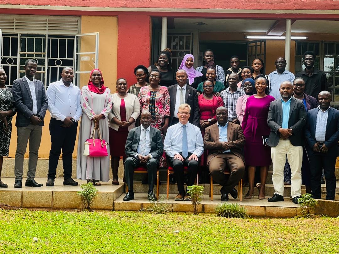Group photo of Professor Roberts with faculty from Makerere Business School