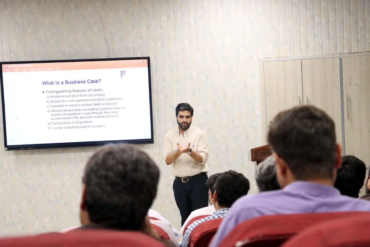 During the workshop Professor Ahmad is explaining "What is a business case?"