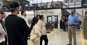 Visiting CEMS students learn how local business initiatives can help solve global problems