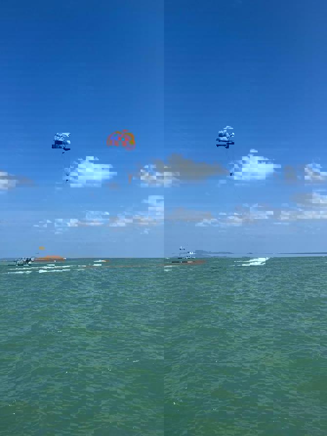 Parasailer pulled by a boat