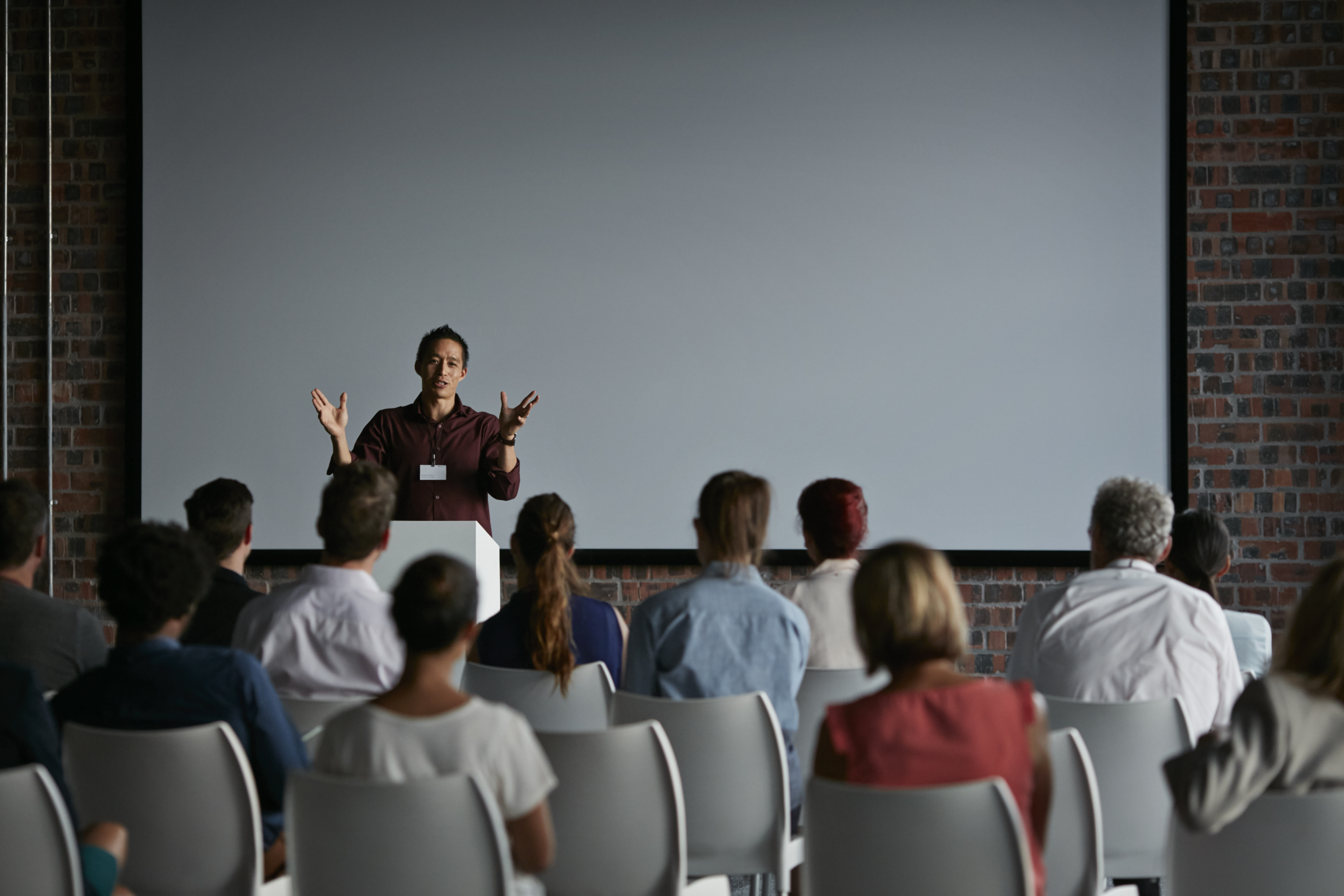 Professor giving a lecture to a group of students