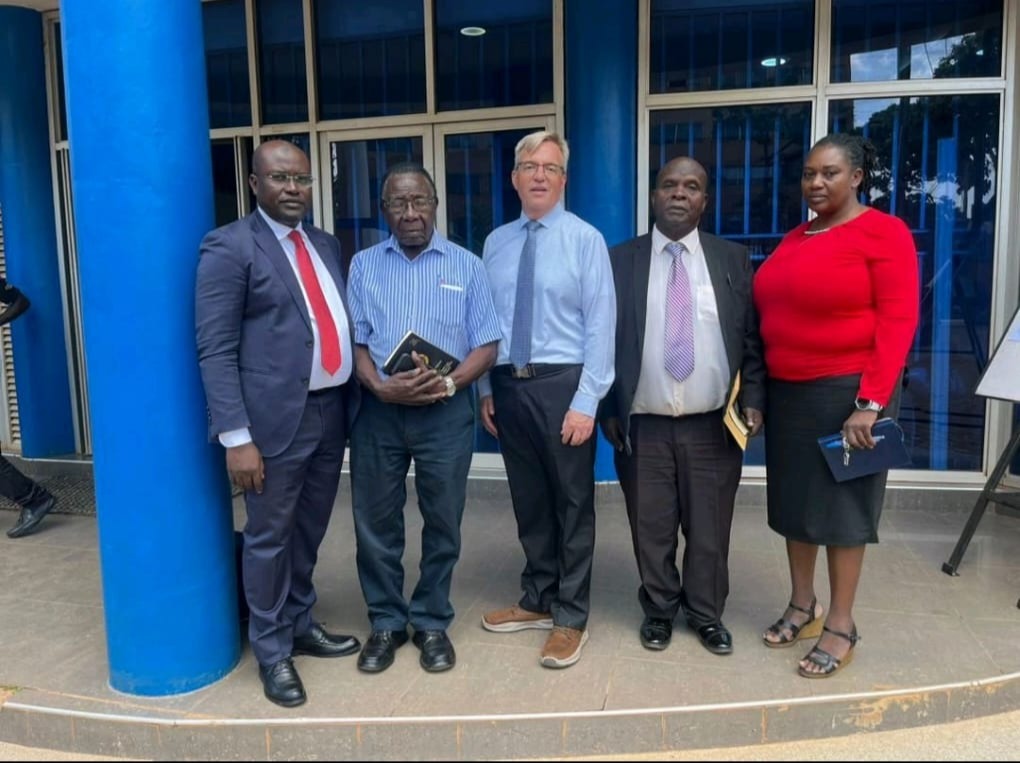 Professor Michael Roberts with the organizers