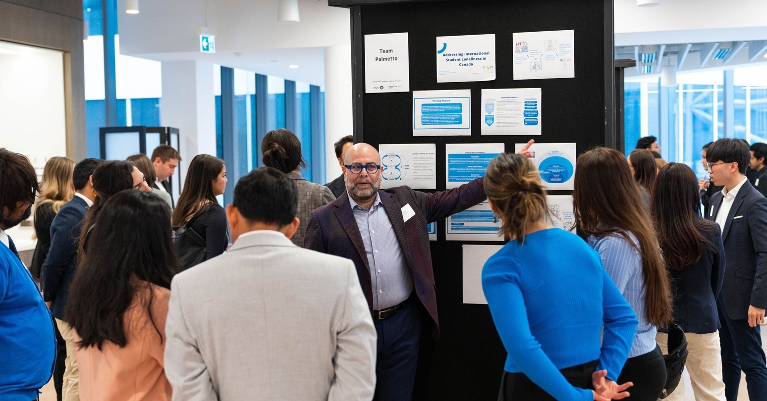 Mazi Raz and students at the 2025 Systems Innovation Challenge