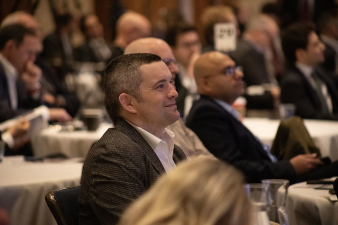 Audience watching afternoon keynote speaker